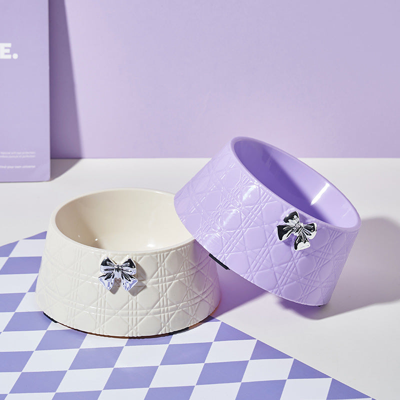 Two PelosettinShop Bowknot Diamond Pet Food Bowls in white and purple with charming bowknots, perfect for elegant pet feeding.